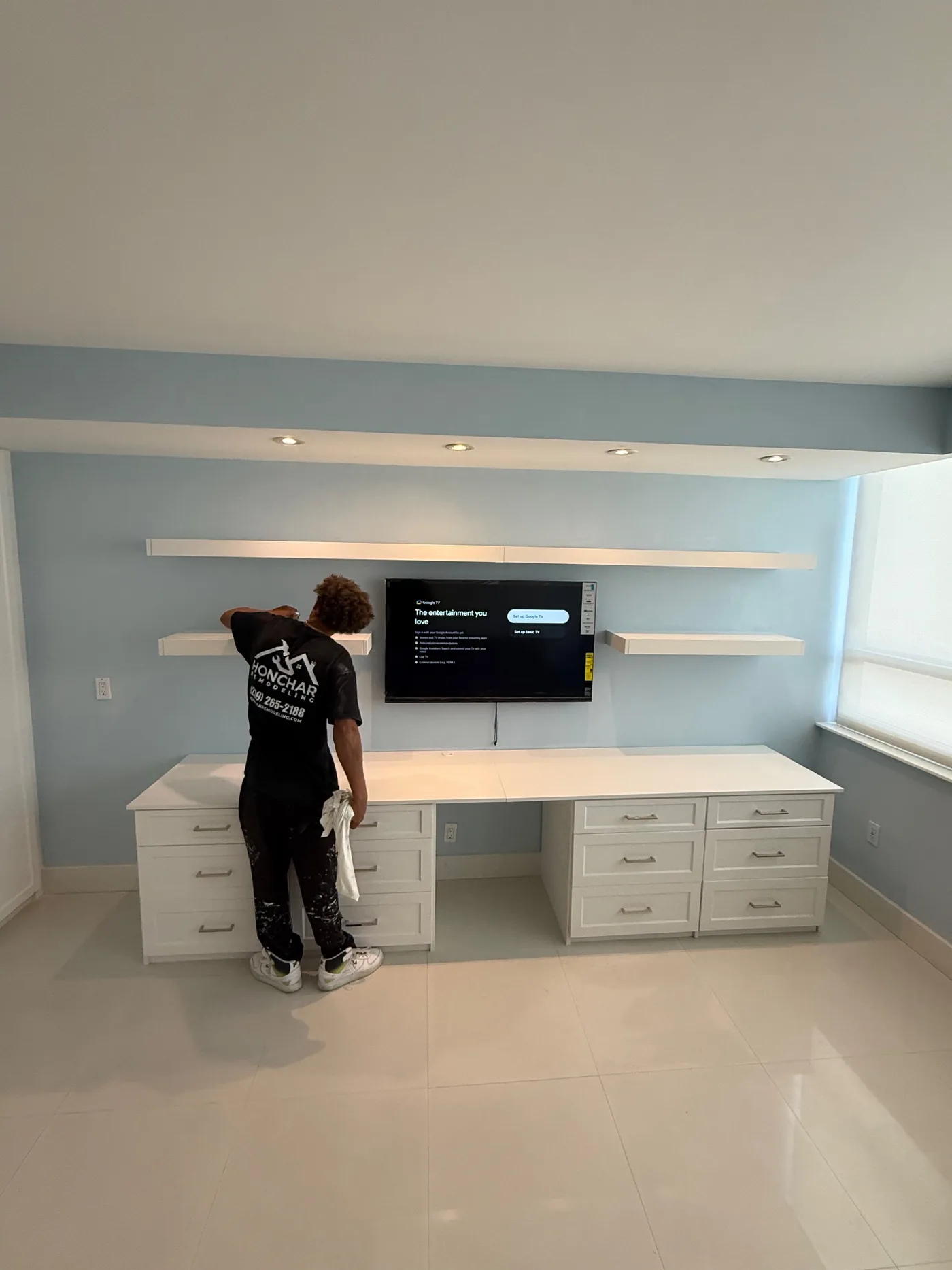Custom shelves and cabinets built into a residential condo