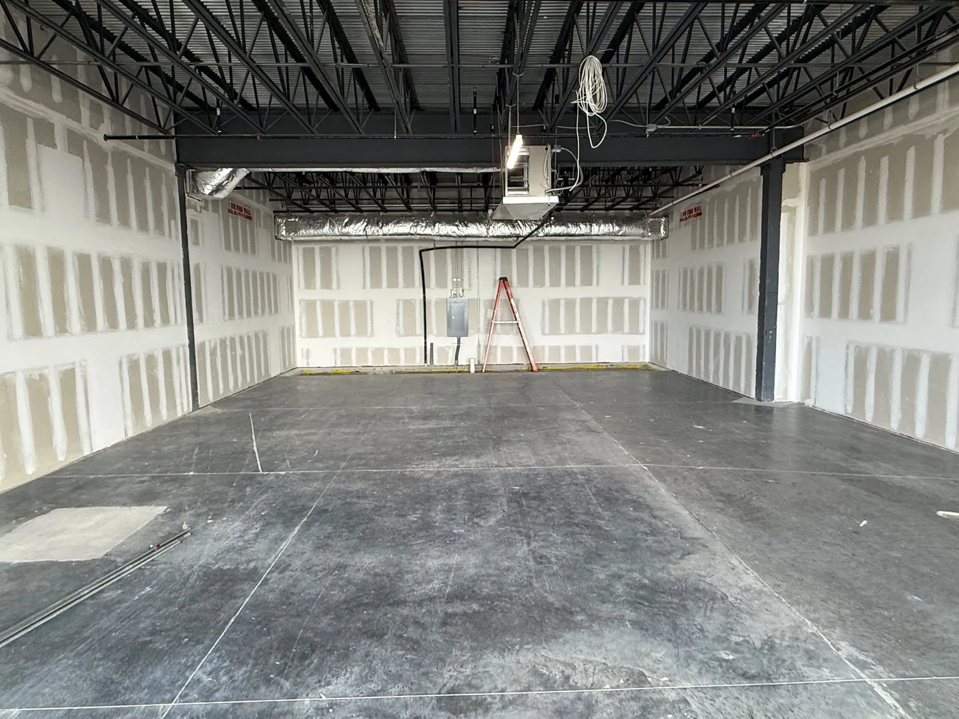 Commercial drywall midway through.